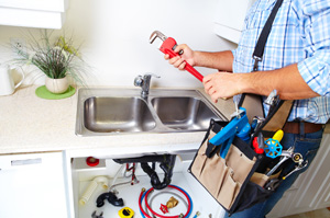 plumber with tools